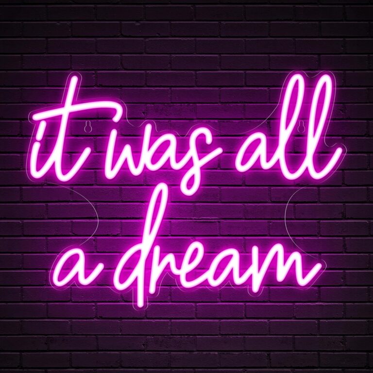 "Pink ‘It Was All A Dream’ neon sign measuring 16.5 x 12.5 inches, featuring glowing LED script for girly room decor. Perfect for bedrooms, parties, bars, salons, or bathrooms, adding a dreamy aesthetic vibe."