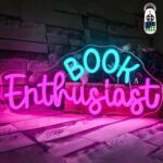“BOOK Enthusiast” pink neon sign for readers and literature lovers. Glowing LED design ideal for bedrooms, reading nooks, or thoughtful gifting.