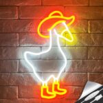 Cowboy Goose Neon Sign featuring a goose wearing a cowboy hat and boots | LED light-up wall décor for kids' rooms, bedrooms, or teen spaces | Fun and cute neon sign perfect for parties, birthdays, or unique room decoration Cowboy Goose Neon Sign featuring a goose wearing a cowboy hat and boots | LED light-up wall décor for kids' rooms, bedrooms, or teen spaces | Fun and cute neon sign perfect for parties, birthdays, or unique room decoration