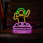 "DJ player neon sign with adjustable brightness - USB-powered LED wall decor for bars, man caves, or anime-themed rooms. Dimmable colorful lighting for parties and gaming spaces."