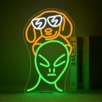 9.8 x 16.5-inch alien holding dog neon sign—quirky green and orange LED wall light for game rooms, bedrooms, or creative spaces.