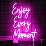 Pink "Enjoy Every Moment" LED neon sign with letter design, perfect for bedroom, salon, party, or bar wall decor.