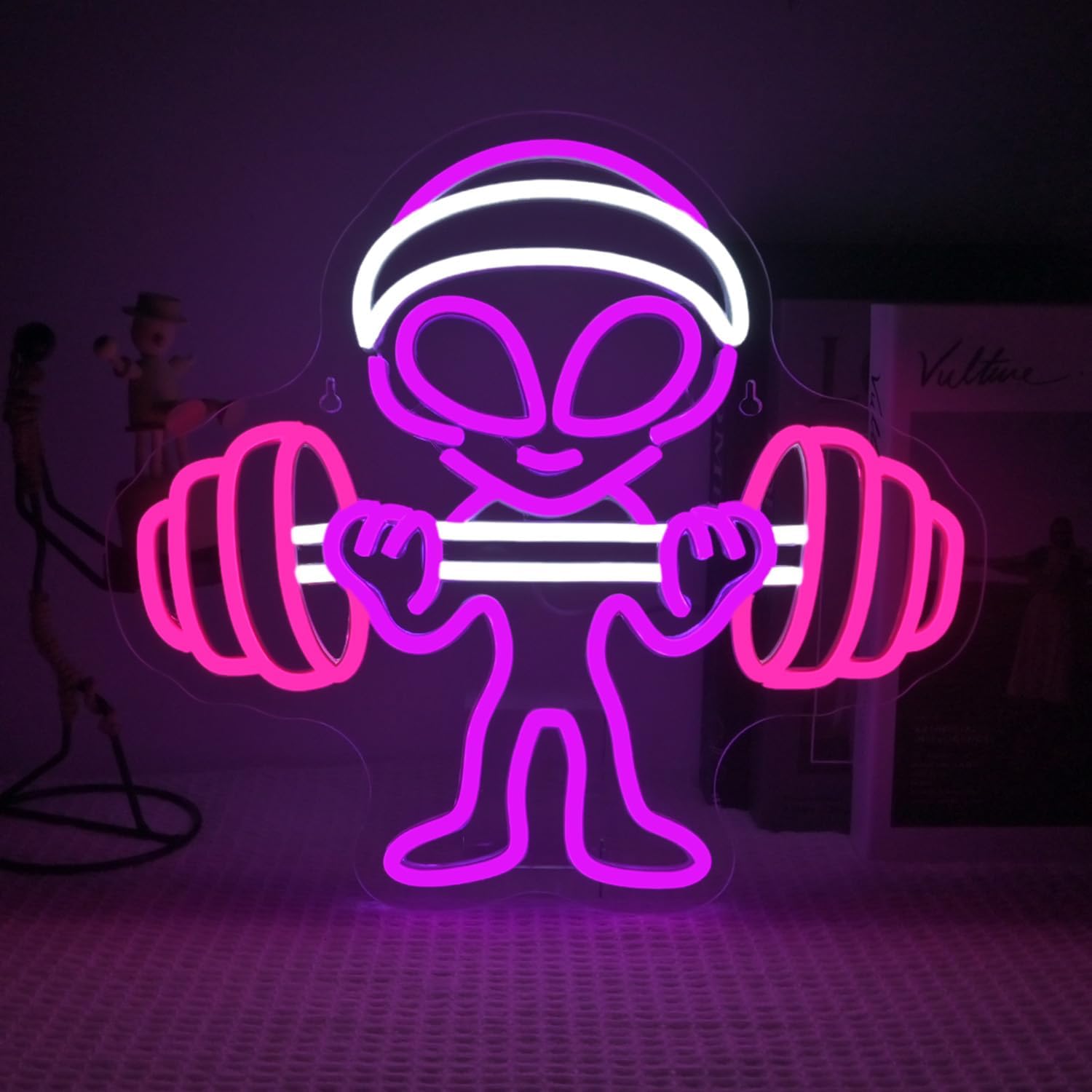 Barbell Alien Neon Sign in green glow, featuring alien lifting weights—perfect for gym, home workout room, or sci-fi-themed wall decor.