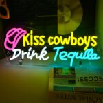 Colorful “Kiss Cowboy Drink Tequila” LED neon sign with vibrant glow, perfect for bars, parties, or cowboy-themed decor.