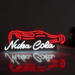 Red Nuka Cola-style neon sign with retro gamer design, perfect for wall decor in man caves, bedrooms, or gaming rooms.