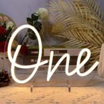 Warm white “One Year Old” LED neon table sign, USB-powered, perfect for birthday parties, weddings, or home and holiday decor.