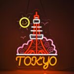 Vibrant Tokyo city LED neon sign with tower and cherry blossom design, ideal for bedrooms, bars, or anime-themed décor.